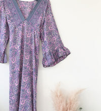 Bluebell lilac vintage-silk free-size ruffled-sleeved tie maxi dress with intricate paisley pattern and soft flowing fabric displayed against a white background with dried pampas grass.
